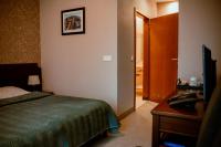 Posteľ alebo postele v izbe v ubytovaní Hotel Kuracyjny Spa & Wellness