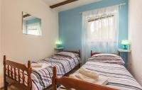 Posteľ alebo postele v izbe v ubytovaní Holiday Home Peroj I