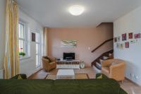 Posezení v ubytování K2 Aparthotel Klínovec Views - Mezonet Apt