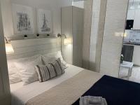 Posteľ alebo postele v izbe v ubytovaní Mar&Mar, apartamento con solárium y piscina