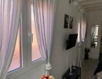 Televízia a/alebo spoločenská miestnosť v ubytovaní Mar&Mar, apartamento con solárium y piscina