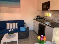 Kuchyňa alebo kuchynka v ubytovaní Mar&Mar, apartamento con solárium y piscina