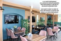 TV a/nebo společenská místnost v ubytování Mavi Restaurant & Apartments 3