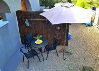 Patio lub wspólna przestrzeń na świeżym powietrzu w obiekcie Apartments Savic