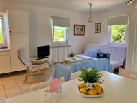 Telewizja i/lub zestaw kina domowego w obiekcie Apartments Savic