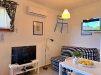 Telewizja i/lub zestaw kina domowego w obiekcie Apartments Savic
