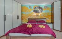 Postel nebo postele na pokoji v ubytování 2 Bedroom Nice Apartment In Grizane