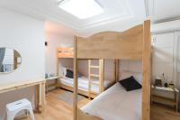 The Blossom Yeonnam Guesthouseにあるベッド