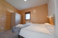 Postel nebo postele na pokoji v ubytování la casita del puente viejo