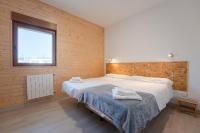 Postel nebo postele na pokoji v ubytování la casita del puente viejo
