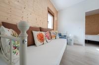 Postel nebo postele na pokoji v ubytování la casita del puente viejo