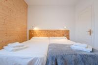 Postel nebo postele na pokoji v ubytování la casita del puente viejo