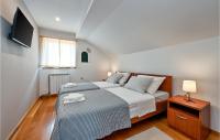 Posteľ alebo postele v izbe v ubytovaní Cozy Home In Maglenca With Sauna