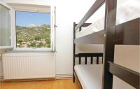 Postel nebo postele na pokoji v ubytování Holiday Home Podorah I