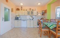 Kuchyň nebo kuchyňský kout v ubytování Two-Bedroom Holiday Home In Betiga