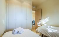A bed or beds in a room at Lovely Apartment In Los Alcázares