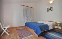 Postel nebo postele na pokoji v ubytování Apartment Trogir Spira Puovica Ii