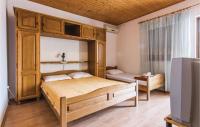 Posteľ alebo postele v izbe v ubytovaní Beautiful Apartment In Starigrad