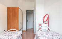 A bed or beds in a room at Nice Home In Modica With Wifi