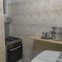 Kuchyň nebo kuchyňský kout v ubytování Room in santa maria tower hy ell dollar