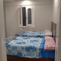 Postel nebo postele na pokoji v ubytování Room in santa maria tower hy ell dollar