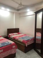 Postel nebo postele na pokoji v ubytování Room in santa maria tower hy ell dollar