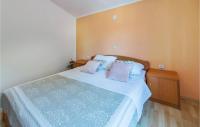 Postel nebo postele na pokoji v ubytování Holiday Home Betiga Betiga