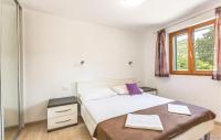 Posteľ alebo postele v izbe v ubytovaní Six-Bedroom Holiday Home In Zagvozd