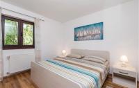 Posteľ alebo postele v izbe v ubytovaní Stunning Home In Banjol