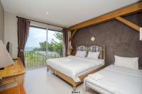 Postel nebo postele na pokoji v ubytování Venice Beach Village Hua Hin Pool Villa