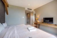 Postel nebo postele na pokoji v ubytování Venice Beach Village Hua Hin Pool Villa