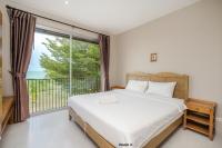 Postel nebo postele na pokoji v ubytování Venice Beach Village Hua Hin Pool Villa
