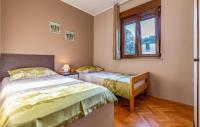 Posteľ alebo postele v izbe v ubytovaní Amazing Apartment In Banjole With Wifi