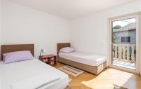Posteľ alebo postele v izbe v ubytovaní Awesome Apartment In Veli Losinj