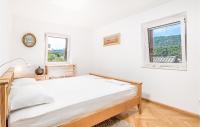 Posteľ alebo postele v izbe v ubytovaní Awesome Apartment In Veli Losinj