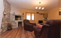 Televízia a/alebo spoločenská miestnosť v ubytovaní Holiday Home Peresiji I