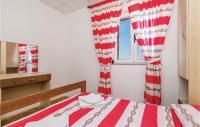 Postel nebo postele na pokoji v ubytování Beautiful Apartment In Dinjiska
