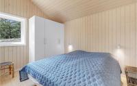 Postel nebo postele na pokoji v ubytování Three-Bedroom Holiday Home In Nexo