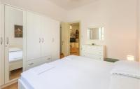 Posteľ alebo postele v izbe v ubytovaní Apartment Makarska Lxxxi