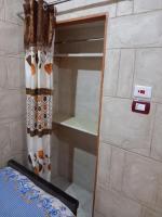 Postel nebo postele na pokoji v ubytování Hashem Nubian Guest House
