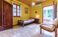Posteľ alebo postele v izbe v ubytovaní Two-Bedroom Apartment In Premantura