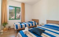 Posteľ alebo postele v izbe v ubytovaní Holiday Home Gdinj With Sea View I