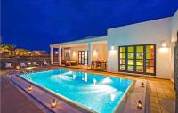 The swimming pool at or close to Nice Home In Playa Blanca With Sauna