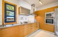 A kitchen or kitchenette at Nice Home In Playa Blanca With Sauna