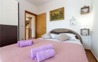 Posteľ alebo postele v izbe v ubytovaní Nice Apartment In Rovanjska - Jasenice