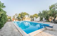 The swimming pool at or close to Nice Home In Modica With Wifi