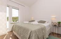 Posteľ alebo postele v izbe v ubytovaní 2 Bedroom Amazing Apartment In Bilice