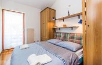 Posteľ alebo postele v izbe v ubytovaní Lovely Apartment In Opatija With Wifi