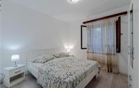 Postel nebo postele na pokoji v ubytování Holiday Home Prizba Bb Vi