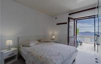 Postel nebo postele na pokoji v ubytování Holiday Home Prizba Bb Vi